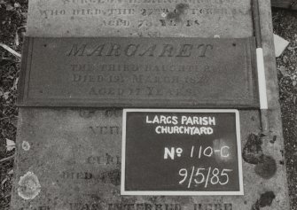 View of plate on table tomb commemorating Margaret (d. 1827), third daughter of the late Thomas Carnie Esq.
Largs Parish Churchyard No 110-C.