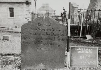 View of headstone with sinuous top.
Insc: "Erected by John Morrice Mariner in memory of his daughter Jean who departed this life the 6th of May 1805 aged 16 years."
Largs Parish Churchyard no 25
