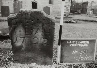 View of headstone with concave shoulders.
Insc: "G.F: I.H
            I.L:A.H 
            1722."
Largs Parish Churchyard no 30
