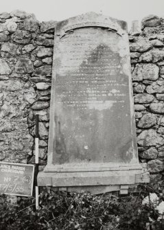 View of  headstone with slight triangular top and decorative scroll.
Insc: "Matthew Underwood.  Janet his...1827.  Agnes born.....died March...William his son....died Jan?....Thomas born...died...Catherine Anderson Underwood...died June...Mary Underwood died...aged...Matthew Underwood died...Also Mary Anderson his wife died Oct 1869? aged ?2 years.  Also Matthew Underwood died Feb...186? aged....years."
Largs Parish Churchyard No 7 (SG I) 
