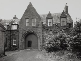 View of caretaker's house from E.