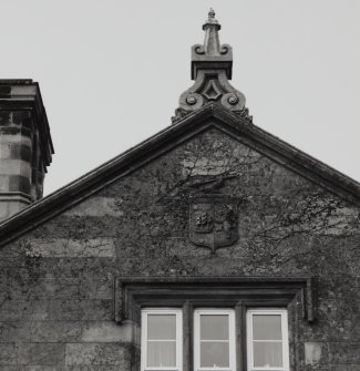Detail of armorial panel on W front.