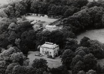 Aerial view showing house and gardens.