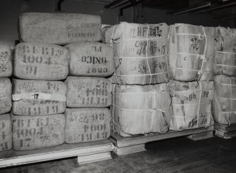 368 Alexandra Parade, WD & HO Wills Tobacco Factory, interior
View of tobacco bales with banana leaf and hessian packing in threshing and blending area, second floor