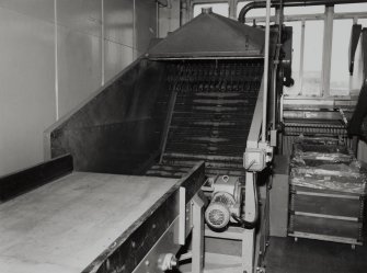 368 Alexandra Parade, WD & HO Wills Tobacco Factory, interior
View of threshing machine in threshing and blending area, second floor