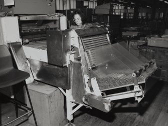 368 Alexandra Parade, WD & HO Wills Tobacco Factory, interior
View of cigar-pressing machine, secondary production area, cigars, first floor