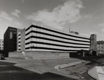 View of multi-storey car park from SW