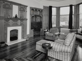 View of drawing room from North East showing probable William Leiper designed fireplace and seating nook.
