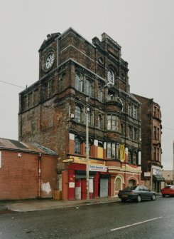 View from SE of block occupying 26-28 Bain Street, showing its E and S sides