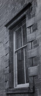 View of specimen ground floor window with grill, Martyr’s Public School, Glasgow.