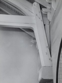 Interior view of Martyr’s Public School, Glasgow, showing roof structure over central block and detail of wall post.