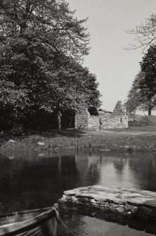 The Clachan. Pre-Reformation church, or 'Cill', modelled on that of Kilmory, Knapdale together with the Macmillan cross.