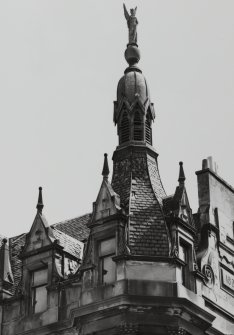 Glasgow, 2-6 Cadogan Street.
Detail of South-West corner spire with statuette and 1888 chimney.