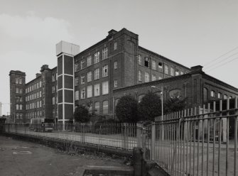 Glasgow, 121 Carstairs Street, Cotton Spinning Mills.
General view from SW of W and S sides of mill.