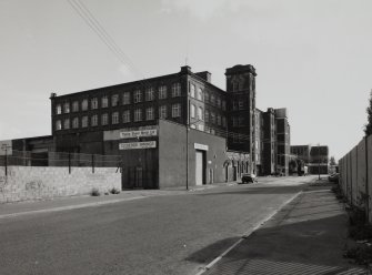 Glasgow, 121 Carstairs Street, Cotton Spinning Mills.
General view from NW of W and N sides of mill.