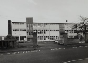 View of main 3 storey classroom block from West