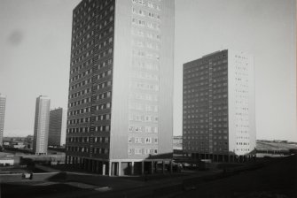 Glasgow, Coll Street Development.
General view from South of specimen block with Petershill Drive high-rise flats in the background.