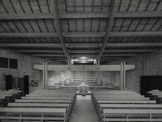 Glasgow, 60 Drumchapel Road, St. Benedicts R.C. Church, interior.
General view from North-West below the sweep of the wooden roof.