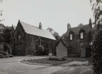 View from NW showing rear of lodge and halls