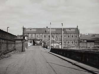 Glasgow, 18 Clydebrae Street, Govan Graving Docks.
General view from S-S-W, of workshop, weighbridge and offices at North-West end of no.1 graving dock.
