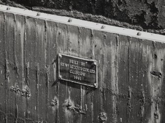 Glasgow, 18 Clydebrae Street, Govan Graving Docks.
General view of makers name plate on no.2 graving dock.
Insc: 'Built by Sir Wm. Arrol & Coy Ltd. Glasgow. 1961.'