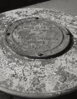 Glasgow, 18 Clydebrae Street, Govan Graving Docks.
General view of maker's plate on electric capstan of South-East end of no.2 graving dock.
Insc: 'Stothert And Pitt, Bath, England' 'Duty 15 Tons At 75 RPM, REF No 4472977. Remove Cover To Lubricate Top Bearing'.