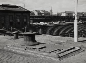 Glasgow, 18 Clydebrae Street, Govan Graving Docks.
View from East of electric capstan and part of power house and part of no.3 graving dock.
