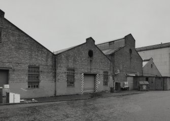 View from SW of central bays of former Plumbers' shops