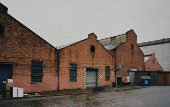 View from SW of central bays of former Plumbers' shops