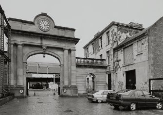 View of 'clock' entrance arch from SSW