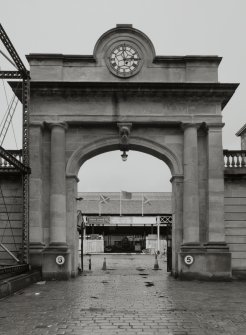 Detail of 'clock' entrance arch from S