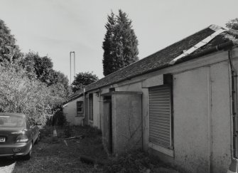 E House. SE Outbuilding. View from NW.