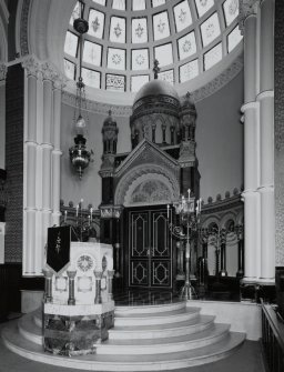 Interior. Apse including ark, pulpit, and perpetual light