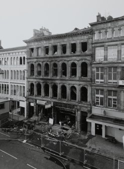 Elevated view of entrance front from third floor window of building to NE