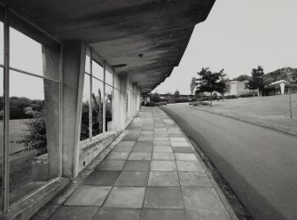 Glasgow, Lainshaw Drive, Linn Crematorium.
General view of South-East covered walk from South-East, showing cantilevered concrete construction.