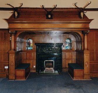 Glasgow, 52-56 Langside Drive, interior.
General view of ground floor, reception room, ingle-nook fireplace with stag's heads above.