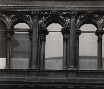 View of central window bay at second floor level on W wall.