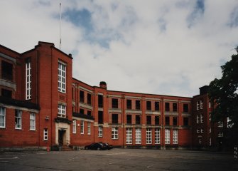 View of main E front from SE