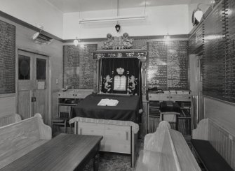 Interior. 'Mini' Synagogue in W corner. Parokhet curtain closed