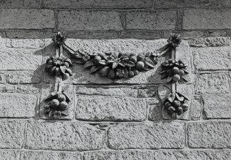 South facade, detail of swag decoration over former entrance