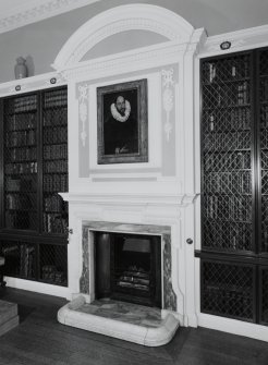 Ground floor, library, interior view of fireplace and overmantle at north end