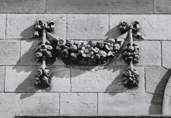 South facade, west wing, detail of swag decoration