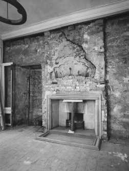 Interior.
View of W wall and fireplace, principal apartment, first floor.