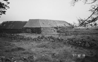 General view of steading from N, showing main range containing horse-powered fixed-barn threshing mill, with turfed horse-engine platform visible at far end (right)