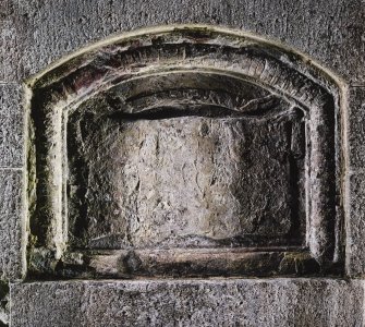 Detail of inscribed panel above door