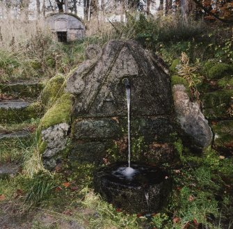 View of fountain with well head in background