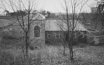 View of surviving complex from N comprising village hall, engine-house, turbine house and old 
turbine-shaft.