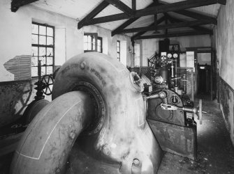 Interior.
View of turbine and generator plant (1923) from discharge side.