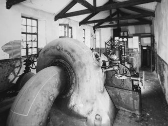 Interior.
View of turbine and generator plant (1923) from discharge side.