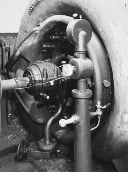 Interior.
View of turbine and generator plant (1923) showing turbine bearing and scroll casing.